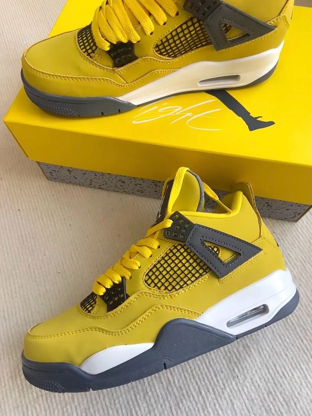 Air Jordan 4 Retro ‘Lightning’ Men’s Yellow/Gray Mid-Top Sneakers